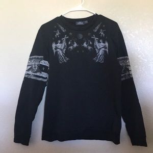 Black sweater with designs